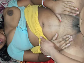 Desi Aunty cheats exceeding husband with a hung Latina increased by fucks him exceeding hammer away sofa